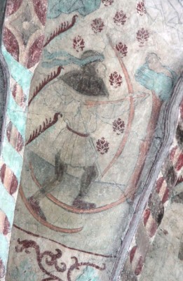 Skiing hunter from Osterunda Church in Uppland, Sweden